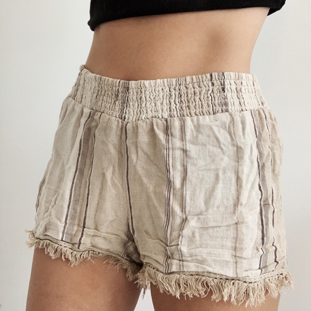 Tan frayed shorts